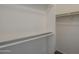 Spacious walk-in closet offers ample storage with shelving, ideal for organization at 1402 E Guadalupe Rd # 122, Tempe, AZ 85283