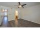 Spacious main bedroom showcasing hardwood floors, and an ensuite bathroom at 1402 E Guadalupe Rd # 122, Tempe, AZ 85283