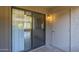 Outdoor patio featuring a door with sliding glass, offering a seamless transition between indoor and outdoor spaces at 1402 E Guadalupe Rd # 122, Tempe, AZ 85283