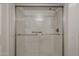 Modern shower with glass doors, dual shower heads, and safety bars offers a luxurious bathing experience at 1402 E Guadalupe Rd # 122, Tempe, AZ 85283