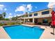 Beautiful pool with patio, outdoor kitchen, and landscaping with ample space for entertaining at 14186 N 100Th Pl, Scottsdale, AZ 85260