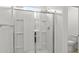 Bathroom featuring a glass door shower at 1518 S 241St Ave, Buckeye, AZ 85326