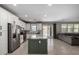 Beautiful kitchen with an island, stainless appliances, and seamless transition to the backyard at 20926 E Longwood Dr, Queen Creek, AZ 85142