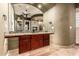 Well-lit bathroom with dual sinks, granite countertops, and seamless access to a walk-in shower at 2558 E Page Ct, Gilbert, AZ 85234