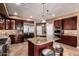 Spacious kitchen with an expansive island, stainless steel appliances, and beautiful cabinetry, perfect for entertaining at 2558 E Page Ct, Gilbert, AZ 85234