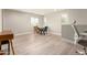 Bonus room with light colored walls, luxury vinyl floors, and a modern table at 263 N Wilson Dr, Chandler, AZ 85225