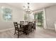 Cozy dining room featuring a modern light fixture and sliding glass doors at 263 N Wilson Dr, Chandler, AZ 85225