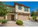 Two-story home with desert landscaping, shuttered window and an attached two-car garage at 263 N Wilson Dr, Chandler, AZ 85225