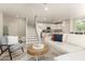 Bright living room with stylish furnishings and staircase access at 263 N Wilson Dr, Chandler, AZ 85225