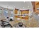 Spacious kitchen featuring an island, granite countertops, stainless appliances, and breakfast bar seating at 2642 S Joplin --, Mesa, AZ 85209