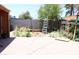 Spacious backyard features a brick patio area and green vegetation growing around the home at 2718 W Montebello Ave, Phoenix, AZ 85017