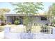 Single-story home featuring desert landscaping and a security door at the entryway at 2718 W Montebello Ave, Phoenix, AZ 85017