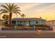 Charming single story home with desert landscaping, solar panels, and a friendly dog at 2718 W Montebello Ave, Phoenix, AZ 85017