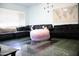 Spacious living room with comfortable seating arrangements and ample natural light at 2718 W Montebello Ave, Phoenix, AZ 85017