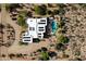 Overhead shot of a property with solar panels, desert landscaping, and refreshing pool at 27203 N 64Th Way, Scottsdale, AZ 85266
