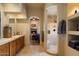 Bathroom with bathtub, walk-in shower, double sinks, vanity and granite countertops at 27203 N 64Th Way, Scottsdale, AZ 85266