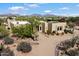 Stylish home showcasing desert landscaping with native plants and serene mountain views at 27203 N 64Th Way, Scottsdale, AZ 85266