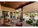 Inviting outdoor living space with a covered patio, comfortable seating, and a view of the pool at 27203 N 64Th Way, Scottsdale, AZ 85266