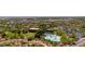 An aerial view of a community featuring pools, parks, and walking paths at 29431 N 122Nd Gln, Peoria, AZ 85383