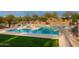 Beautiful community pool featuring several lounge chairs and a shallow end for children at 29431 N 122Nd Gln, Peoria, AZ 85383