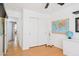 Bedroom with sliding closet doors, a world map and globe that adds character to the space at 3133 E Redwood Ct, Phoenix, AZ 85048
