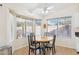 Cozy breakfast nook with circular table, floral chairs, and natural light at 3133 E Redwood Ct, Phoenix, AZ 85048