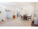 Spacious living area featuring tile floors and convenient access to adjacent living areas at 3133 E Redwood Ct, Phoenix, AZ 85048