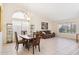 Comfortable dining and living space featuring tile flooring and lots of natural light at 3133 E Redwood Ct, Phoenix, AZ 85048