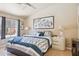 Inviting main bedroom with large window, ensuite bath, and ample natural light at 3133 E Redwood Ct, Phoenix, AZ 85048