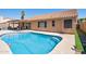 Refreshing private pool with cool, clear water and views of the home's exterior at 3133 E Redwood Ct, Phoenix, AZ 85048