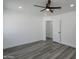 Spacious bedroom with laminate flooring, a ceiling fan, recessed lighting and natural light at 346 W Edgemont Ave, Phoenix, AZ 85003