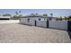 Exterior of building shows neutral paint with a modern paint scheme and a gravel yard at 346 W Edgemont Ave, Phoenix, AZ 85003