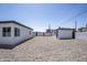 Exterior of building shows neutral paint with a modern paint scheme and a gravel yard at 346 W Edgemont Ave, Phoenix, AZ 85003