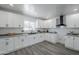 Bright kitchen featuring white cabinets, modern appliances, and a stainless steel sink at 346 W Edgemont Ave, Phoenix, AZ 85003