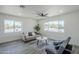 Inviting living room with two couches, a center table, and large bright windows at 346 W Edgemont Ave, Phoenix, AZ 85003