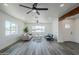 Large windows fill the spacious living room with light, complementing the hardwood floors at 346 W Edgemont Ave, Phoenix, AZ 85003