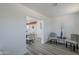 Modern living area with wood-look floors, contemporary furniture, and bright natural light at 346 W Edgemont Ave, Phoenix, AZ 85003