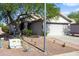 Well-maintained house boasts desert landscaping, two car garage, and a charming covered front entrance at 3534 N 106Th Ln, Avondale, AZ 85392