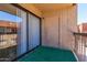 Balcony with sliding glass door and view of apartment complex at 3810 N Maryvale Pkwy # 2020, Phoenix, AZ 85031