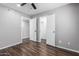 Spacious bedroom with lots of doors leading to other rooms at 3810 N Maryvale Pkwy # 2020, Phoenix, AZ 85031
