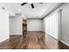 Open concept room with hardwood floors, ceiling fan and bright natural light at 3810 N Maryvale Pkwy # 2020, Phoenix, AZ 85031
