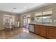 Cozy dining area with backyard access, bright windows, and neutral design at 4101 S Dewdrop Ct, Gilbert, AZ 85297