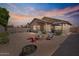 Spacious backyard features a cozy fire pit area, perfect for entertaining guests and enjoying outdoor living at 4459 E Desert Wind Dr, Phoenix, AZ 85044