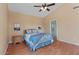 Tranquil bedroom with wood flooring, a vaulted ceiling, and ample natural light for a peaceful retreat at 4459 E Desert Wind Dr, Phoenix, AZ 85044