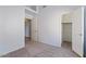 Spacious bedroom featuring high ceilings and walk-in closet at 4459 E Desert Wind Dr, Phoenix, AZ 85044