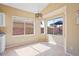 Bright dining area features large windows, providing scenic views and abundant natural light, ideal for Gathering meals at 4459 E Desert Wind Dr, Phoenix, AZ 85044