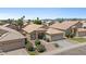 Aerial view of home featuring desert landscaping and front-facing garage at 4459 E Desert Wind Dr, Phoenix, AZ 85044