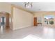 Inviting living room with tile floors, arched doorways, and bright natural light at 4459 E Desert Wind Dr, Phoenix, AZ 85044