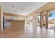 Open living room boasts natural light with seamless access to the outdoors, perfect for indoor-outdoor living at 4459 E Desert Wind Dr, Phoenix, AZ 85044