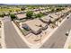 Drone shot highlighting the home's fenced yard, desert landscaping, and neat street appeal in a Gathering neighborhood at 509 W Villa Rita Dr, Phoenix, AZ 85023